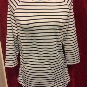 Long sleeved striped shirt.